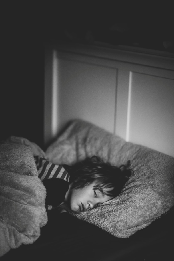 A child sleeping in bed